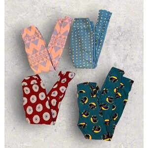 LuLaroe Lot Of (4) Graphic One Size Stretch Leggings.